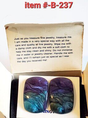 1 Pair of Lady Remington Pierced Earrings, item # B 237,. wt 14 grams.